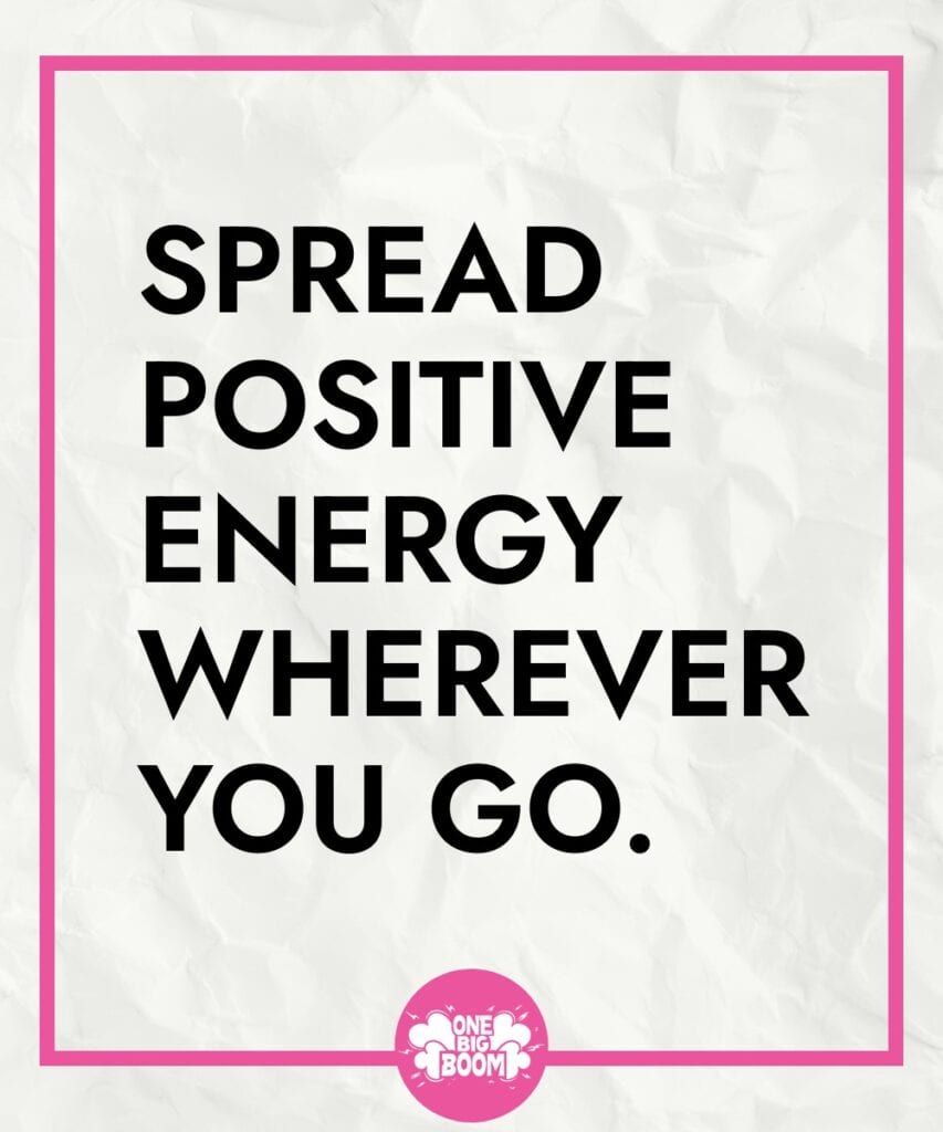 Inspirational quote "spread positive energy wherever you go." on a crumpled paper background.